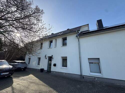 Seitenansicht - Mehrfamilienhaus, Wohnhaus zum Kaufen in Unna