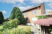 02 Haus Rückansicht - 8 Zimmer Mehrfamilienhaus, Wohnhaus zum Kaufen in Salzkotten