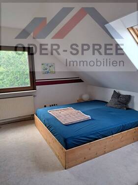 Zimmer im Dachgeschoss - 