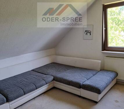 Zimmer im Dachgeschoss - 