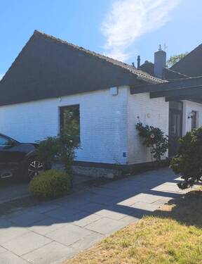 Hausansicht - Schöne, ebenerdige Seniorenwohnung in Westrhauderfehn! Zentrum! Ideal für eine Person!