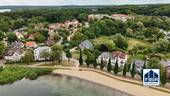 Blick auf den Strand und das Gebäude - 3 Zimmer Etagenwohnung zum Kaufen in Schwerin