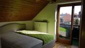 Schlafzimmer mit Balkonzugang - 