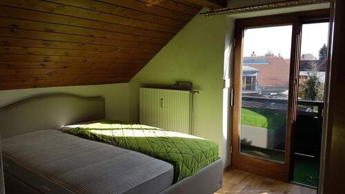 Schlafzimmer mit Balkonzugang - 