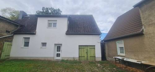 Ansicht Hauptgebäude vom Innenhof - Grundstück mit drei freistehenden Objekten in Obhausen, Sachsen-Anhalt