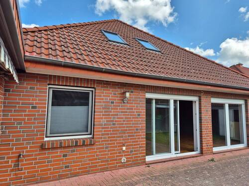 Wohnzimmer-Terrasse - Einfamilienhaus mit 170,00 m² in Barßel / OT Harkebrügge zum Kaufen