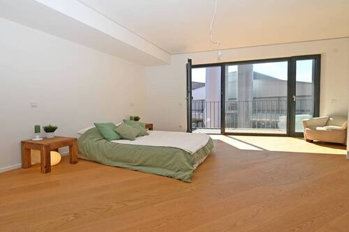 Schlafzimmer mit Balkon/Wintergarten - 