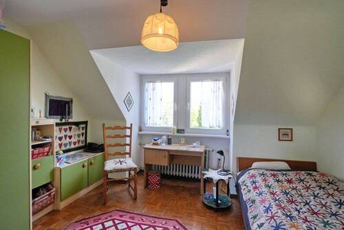 Zimmer im Dachgeschoss - 