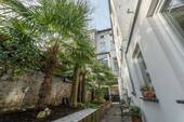 Gartenansicht - Historische Altbau-Maisonettewohnung mit eigenem Garten inmitten des Frankenberger Viertels