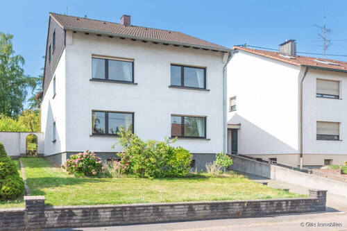 Seitenansicht - 9 Zimmer Mehrfamilienhaus, Wohnhaus zum Kaufen in Wadgassen