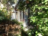 Nord Ostansicht.JPG - Einfamilienhaus im Bungalowstil umgeben von Grün in zentraler Lage