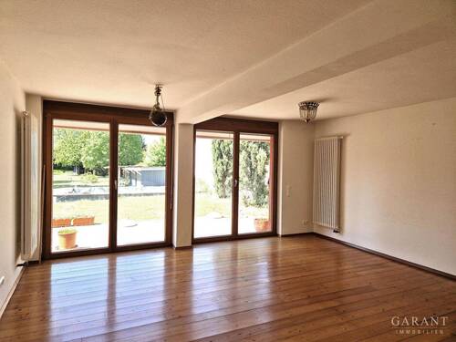 Wohnzimmer - Mehrfamilienhaus, Wohnhaus mit 274,00 m&sup2; in Philippsburg zum Kaufen