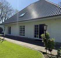 IMMOBILIEN GUMNIOR präsentiert: Stilvoller Bungalow mit großzügigem Raumkonzept in Spelle