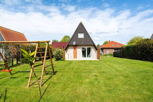 Bild 4 - Mehrfamilienhaus, Wohnhaus mit 52,00 m&sup2; in Neuharlingersiel zum Kaufen