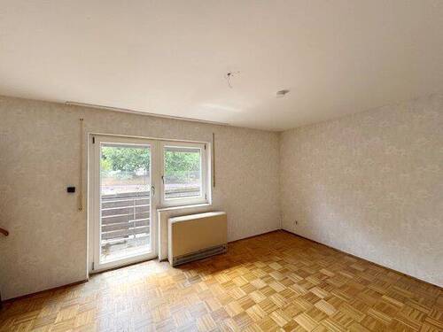 Großes Wohnzimmer mit Balkon im OG.jpg - 