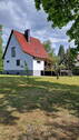 Blick aus dem Garten - Haus und Bootshaus - Land- und Wasseridylle
