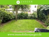 Garten - Charmante Erdgeschosswohnung mit Terrasse und Gartenanteil - Wohnbereich mit offener Einbauküche