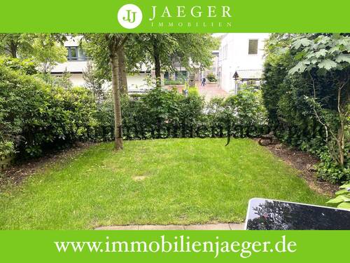 Garten - Charmante Erdgeschosswohnung mit Terrasse und Gartenanteil - Wohnbereich mit offener Einbauküche