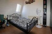 Schlafzimmer 1 im DG Bild 1 - 
