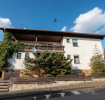 Investment mit Extra-Etage: Vermietetes Zweifamilienhaus mit Ausbaupotenzial - Trippstadt