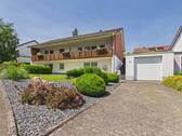 Haus mit Garage - Gepflegtes Einfamilienhaus mit vermieteter Einliegerwohnung in attraktiver Wohnlage von Bitburg!