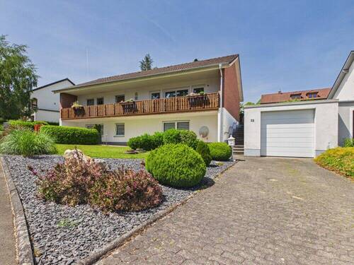 Haus mit Garage - Gepflegtes Einfamilienhaus mit vermieteter Einliegerwohnung in attraktiver Wohnlage von Bitburg!