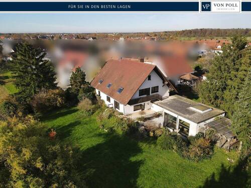 Titelbild - Großzügiges Einfamilienhaus mit Einliegerwohnung und Traumgrundstück in Schutterwald