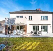 AIGNER - Familienfreundliches Einfamilienhaus mit Einliegerwohnung und flexibler Nutzungsmöglichkeit - Haar