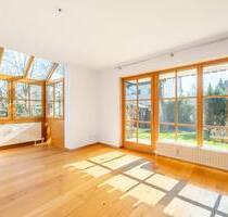 AIGNER - Sonnendurchflutete 2,5-Zimmer-Wohnung mit Garten in attraktiver Süd-West-Ausrichtung - Gröbenzell