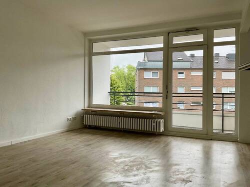 Wohnzimmer - 2 Zimmer Etagenwohnung zur Miete in Neuss