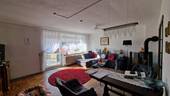 Wohnzimmer mit Zugang zur Terrasse - 
