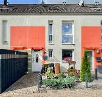 Modernes Reihenmittelhaus mit kleinem Garten und Einzelgarage in Ratingen - KfW 70 Effizienz!