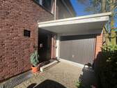 Eingang Wohnung EG + Garage - 