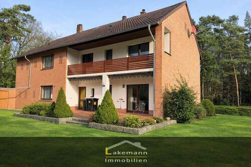 Ansicht Gartenseite - Flexibel wohnen oder investieren – Zweiparteienhaus mit solider Bausubstanz