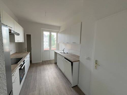 Küche mit Einbauküche - 