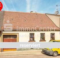 Zwei Häuser - mehrere Möglichkeiten: Vielseitiges Wohnkonzept in Philippsburg