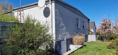 Seitenansicht mit Kellerzugang - 4 Zimmer Einfamilienhaus in Merzdorf