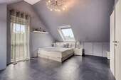 Schlafzimmer im Dachgeschoss - 