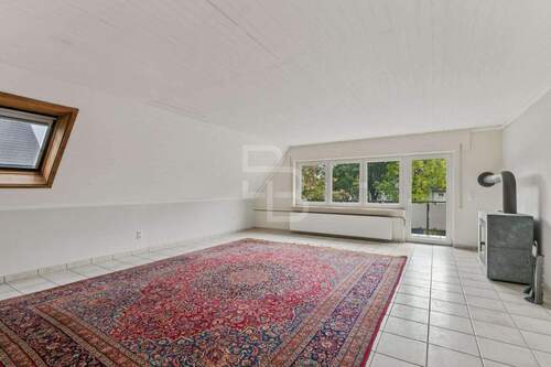 Wohnzimmer mit Balkon OG - 