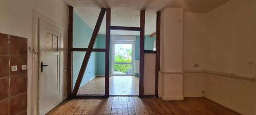 Durchgang Küche Wohnzimmer - Etagenwohnung mit 133,00 m&sup2; in Bochum zum Kaufen