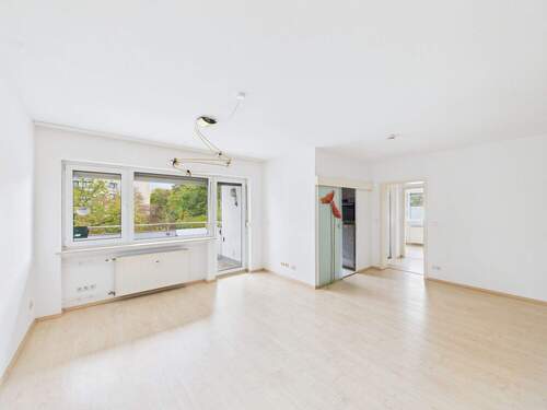 Lichtdurchflutetes Wohnzimmer - Gepflegte 3-Zimmer-Wohnung mit Balkon und Tiefgaragenstellplatz in Wiesbaden-Nordenstadt !