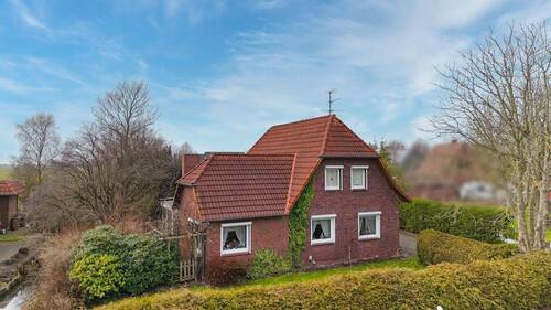 Vorderansicht - Freistehendes Einfamilienhaus mit Wintergarten, Sauna und viel Potenzial in Nordenham-Phiesewarden