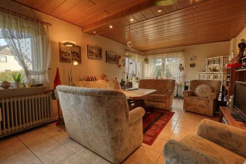 Wohnzimmer - Einfamilienhaus mit 144,70 m&sup2; in Nordenham zum Kaufen