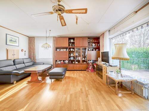 Wohnzimmer Ansicht 2 - Einfamilienhaus mit 140,10 m&sup2; in Oberhausen-Rheinhausen zum Kaufen