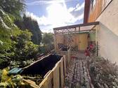 Hochbeete und Carport auf der Westseite - 