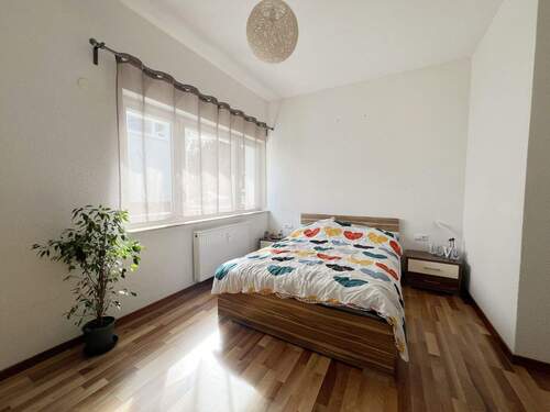 Schlafzimmer 2 (möbliert) - Etagenwohnung mit 94,00 m² in Kornwestheim zum Kaufen
