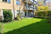 Terrasse mit Garten - 2 Zimmer Terrassenwohnung zum Kaufen in München