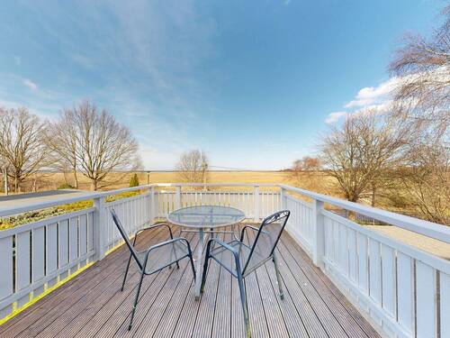 Blick vom Balkon zum Bodden im Dachgeschoss - 