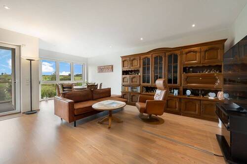 Wohnzimmer - Lichtdurchflutete 3-Zimmer-Wohnung mit hochwertiger Ausstattung in Feldrandlage