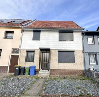 1-Außenansicht - Attraktives, modernisiertes Reihenmittelhaus in Gieboldehausen mit Nebengebäude, Garten & Garage